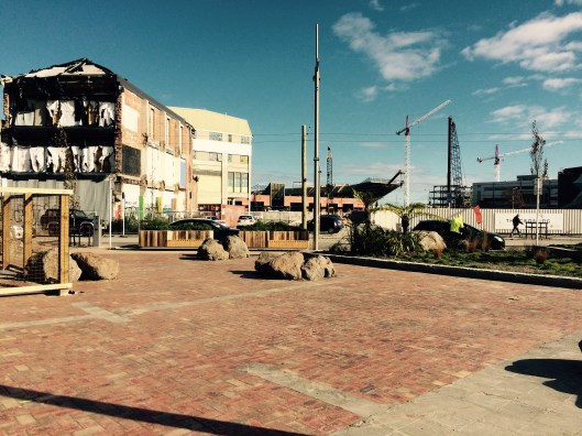 This is a typical view of Christchurch city centre, to the left a building half demolished, in the middle the new bus exchange being built and cranes EVERYWHERE!